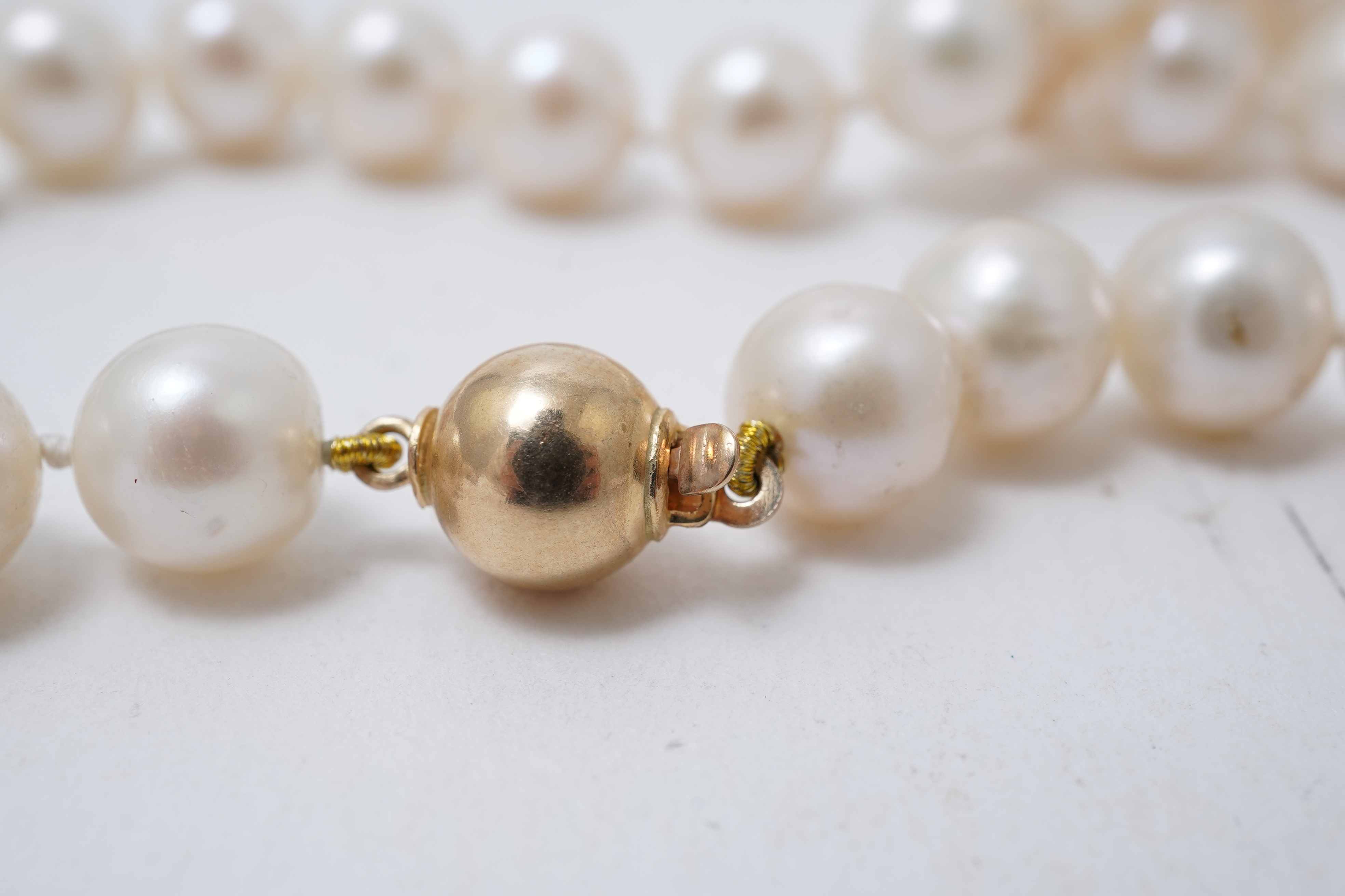 A collection of four cultured pearl necklaces